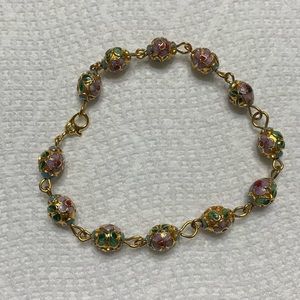 Gold bracelet with daisy beads. Vintage Monet